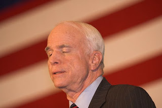 McCain dozing on stage