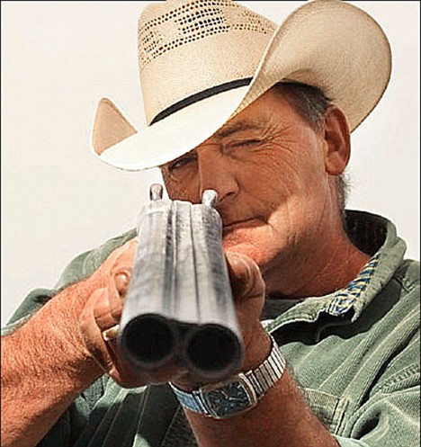 [cow+boy+with+a+barrel.jpg]