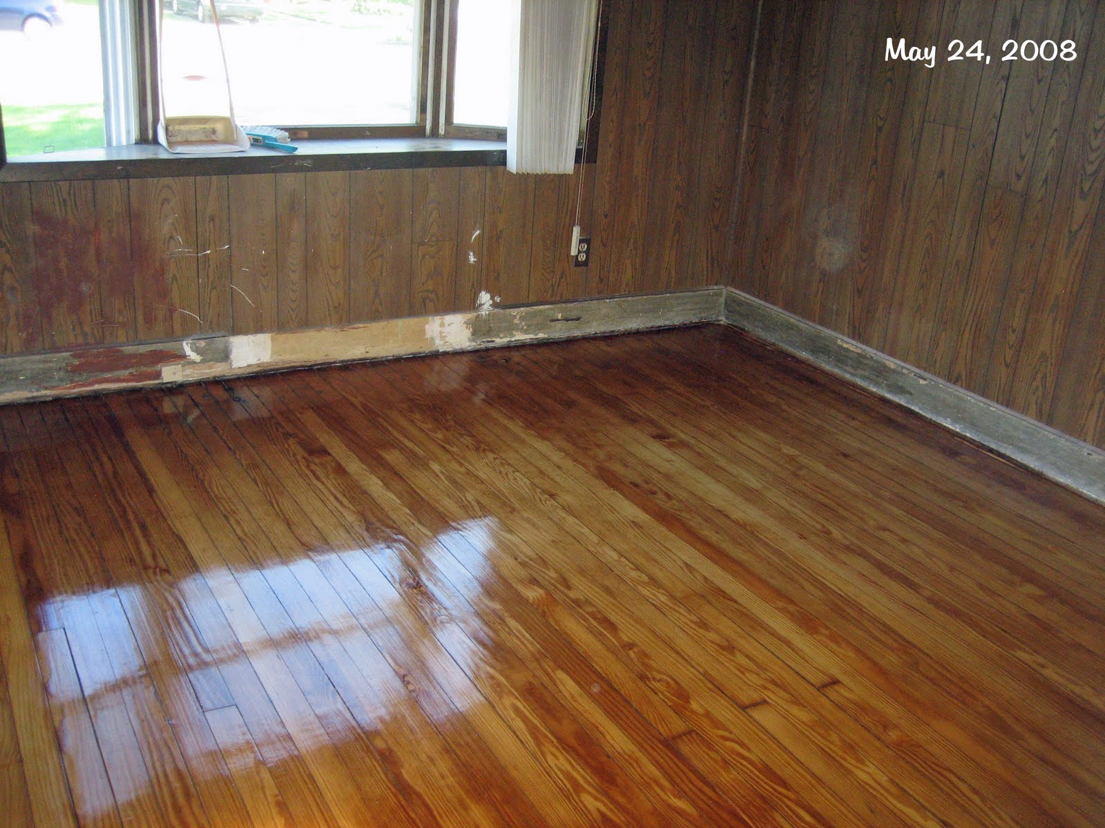 curlyQdesign What to do with dark wood paneling? Paint stripes, of course!