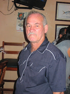 Croc handler in Wacky Wanda's bar in Puerto Quepos Costa Rica