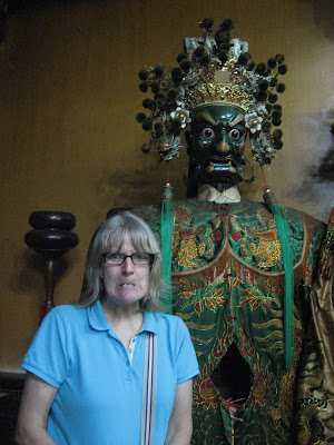 scary face beside God in Tainan City Taiwan