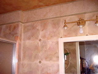 Bathroom wall painted with faux tile finish in 3 colors