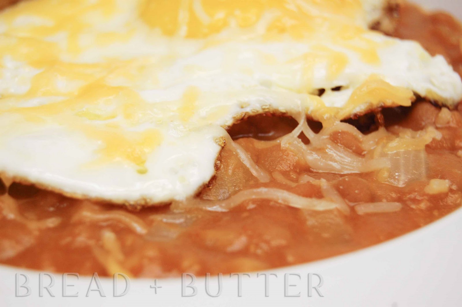 Bread + Butter Pork and Beans with a Fried egg