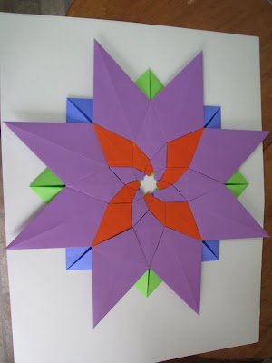 Tomoko Fuse's Origami Quilt Blooming Flowers 1 in Orange, Green, Blue, and Purple reverse side with variation