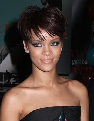 At the moment Rihanna may have big curly red hair or short bobbed red hair