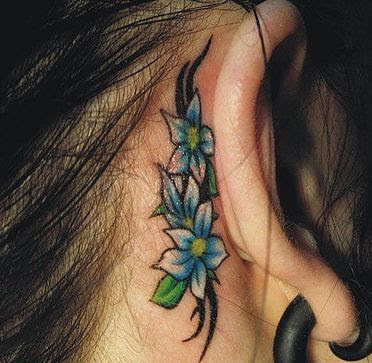 a Hawaiian flower tattoo instead of other typical "pretty tattoos look.