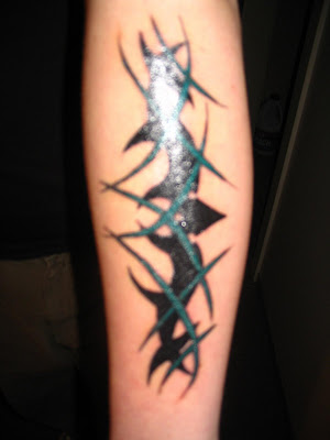 Tribal Tattoos Design on The Arm
