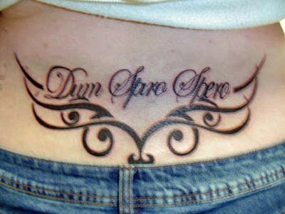 Girl Lower Back Tribal Tattoo