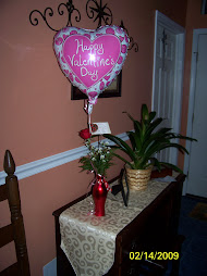 Griffin's Balloon and rose