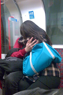 Ugly people snogging on the Central Line