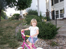 Cora LOVES to ride her bike! Everytime we are outside, she's on her bike!