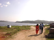 Guruji...Walking towards the river in the village "AWERAHALLI" A proposed site of "Yogic Divine....