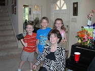 Sara with grandchildren Lindsay, Evan and Blake