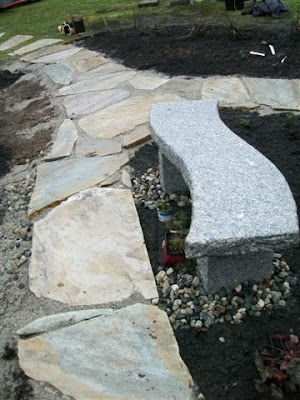 Flagstone path and granite bench