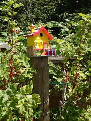 Brightly colored birdhouse