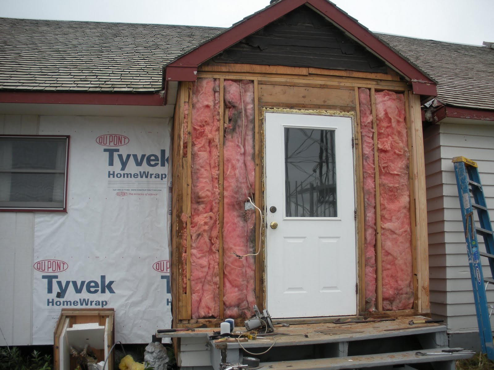 My Mobile Blog Install vapor barrier & new siding