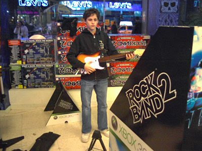 Billy Elliot's Trent Kowalik playing Rock Band 2 in New York City