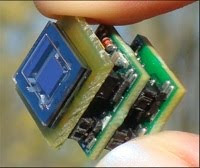 Fully autonomous wireless temperature sensor powered by a vibrational energy harvester 