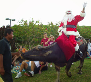 Santa arriving on a carabao
