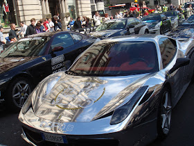 Who's shiny chrome SLR is