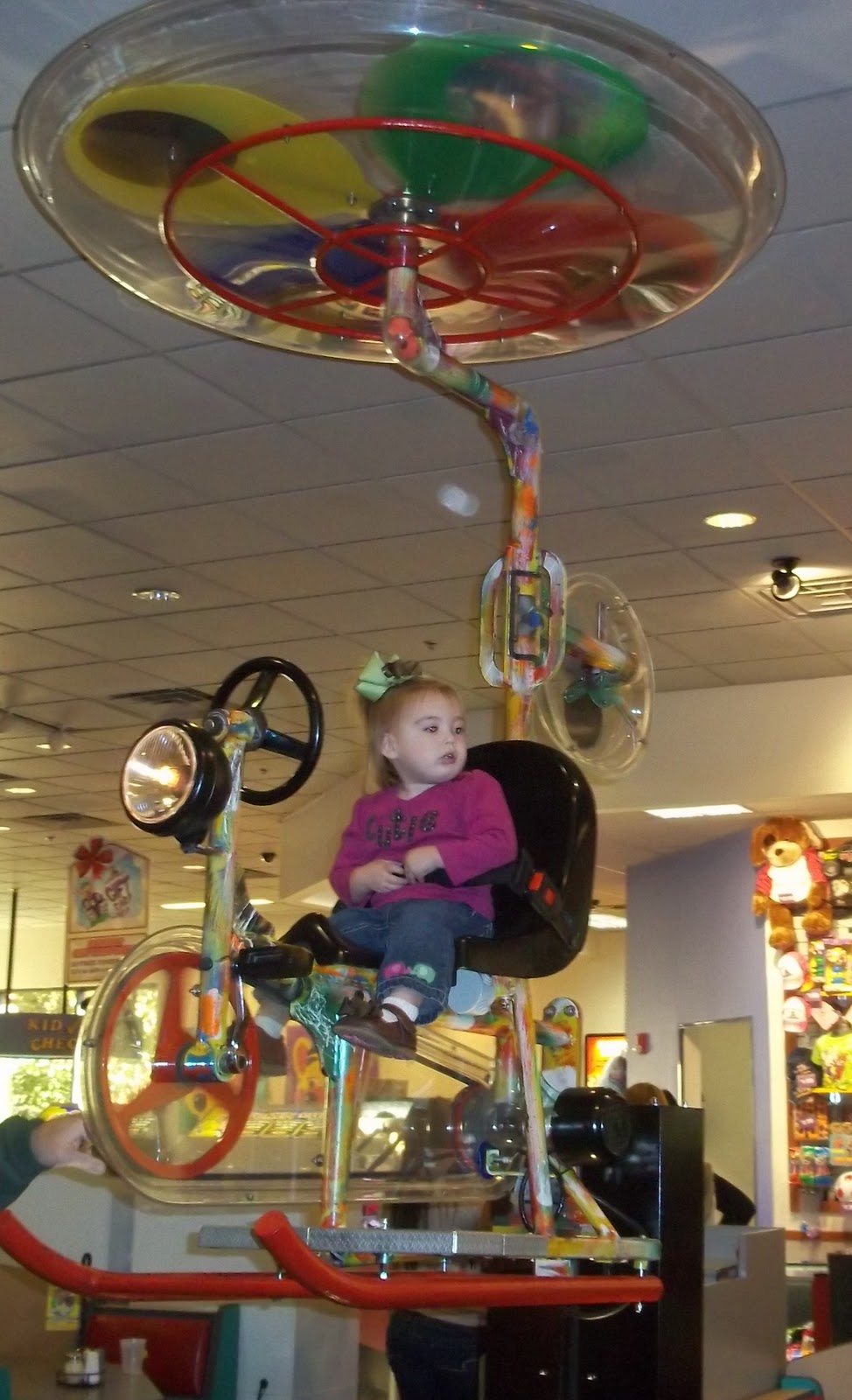 chuck e cheese flying bike