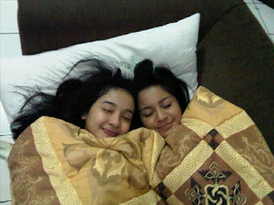 Bella and Kirana are sleeping on couch