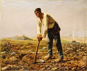 man with hoe