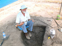 Archaeologist John Connaway excavates a trash pit or midden at the Carson Mound Site