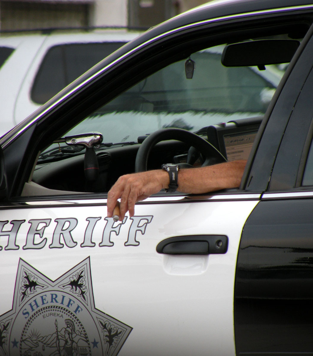 Just A Car Guy: Am I nuts? Or does a cop smoking a cigar at a gas