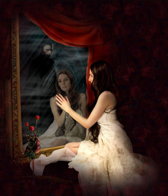 [grav_mulher_olhando_espelho_e_vultom.jpg]