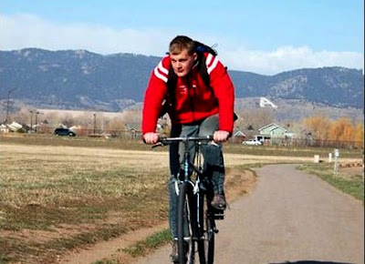 A bike rider pedals along the Spring Creek Trail just near Fort Collins, CO