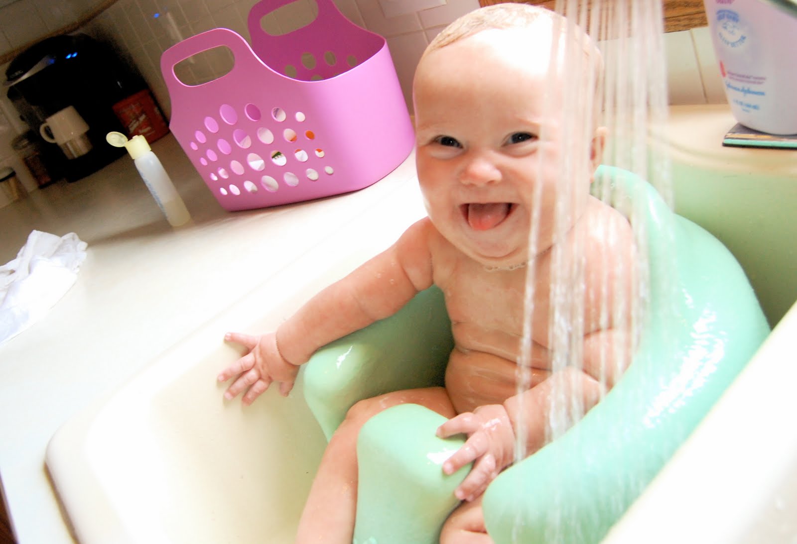 The Harnisch Family Baby Bathing in the Bumbo!
