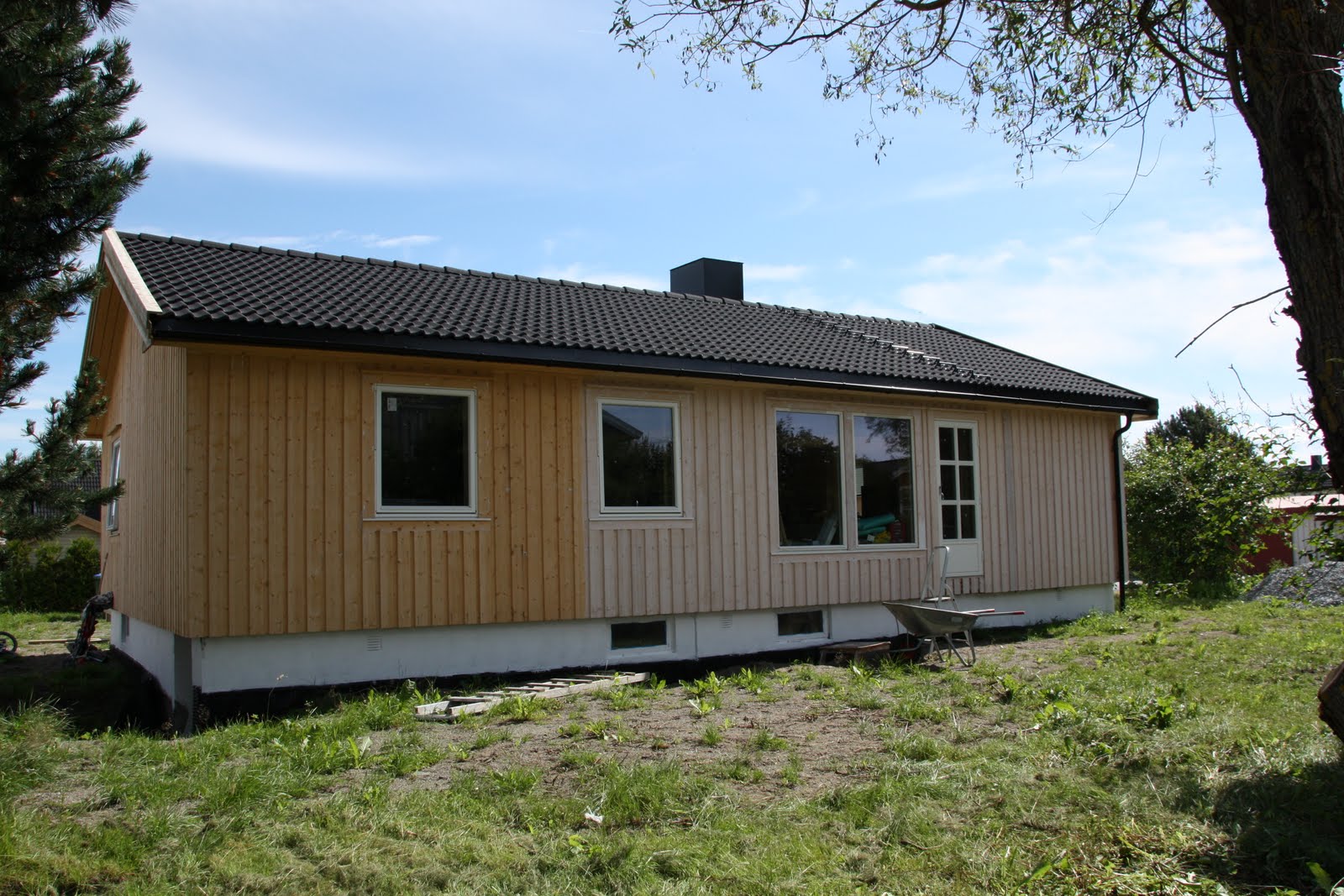 Familieogfoto: maler hus & bygger veranda