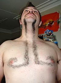 man with moustache and his chest hair cut to extend look