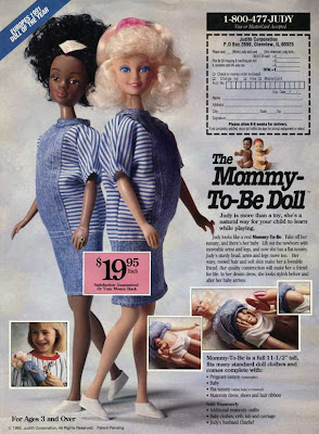Ad for Mommy-To-Be dolls, with white and black pregnant dolls pictured