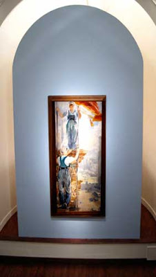 A tall vertical painting of two women shown at the front of a church-like space