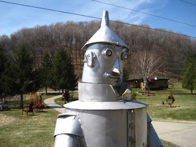 Silver tin woodsman head and shoulders