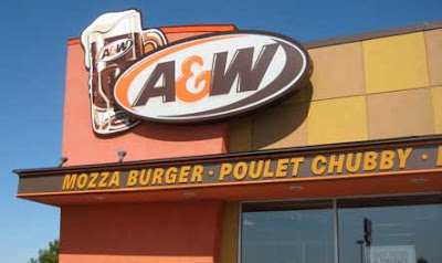 Exterior signage on an A&W fast food restaurant, featuring something called Poulet Chubby