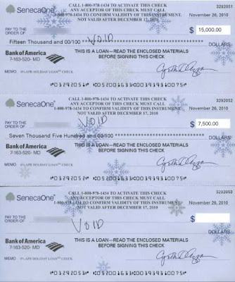 Three checks, one for $15,000, one for $7,500 and one blank, from SenecaOne