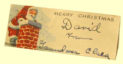 Christmas gift tag handwritten in fountain pen ink To David from Grandma Clara, with Santa Claus illustration