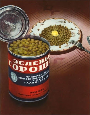 An open can of peas and a bowl of peas