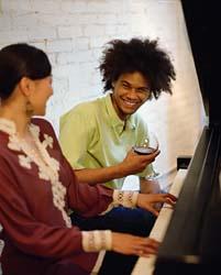 [aa+couple+playing+piano.jpg]