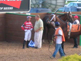 Jockey Scott Spieth receives his instructions before riding Deputy Glitters at Mountaineer Memorial Day 2007