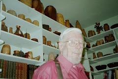 Dad in front of some of his art