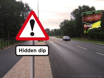 funny road sign that says watch for hidden dips.