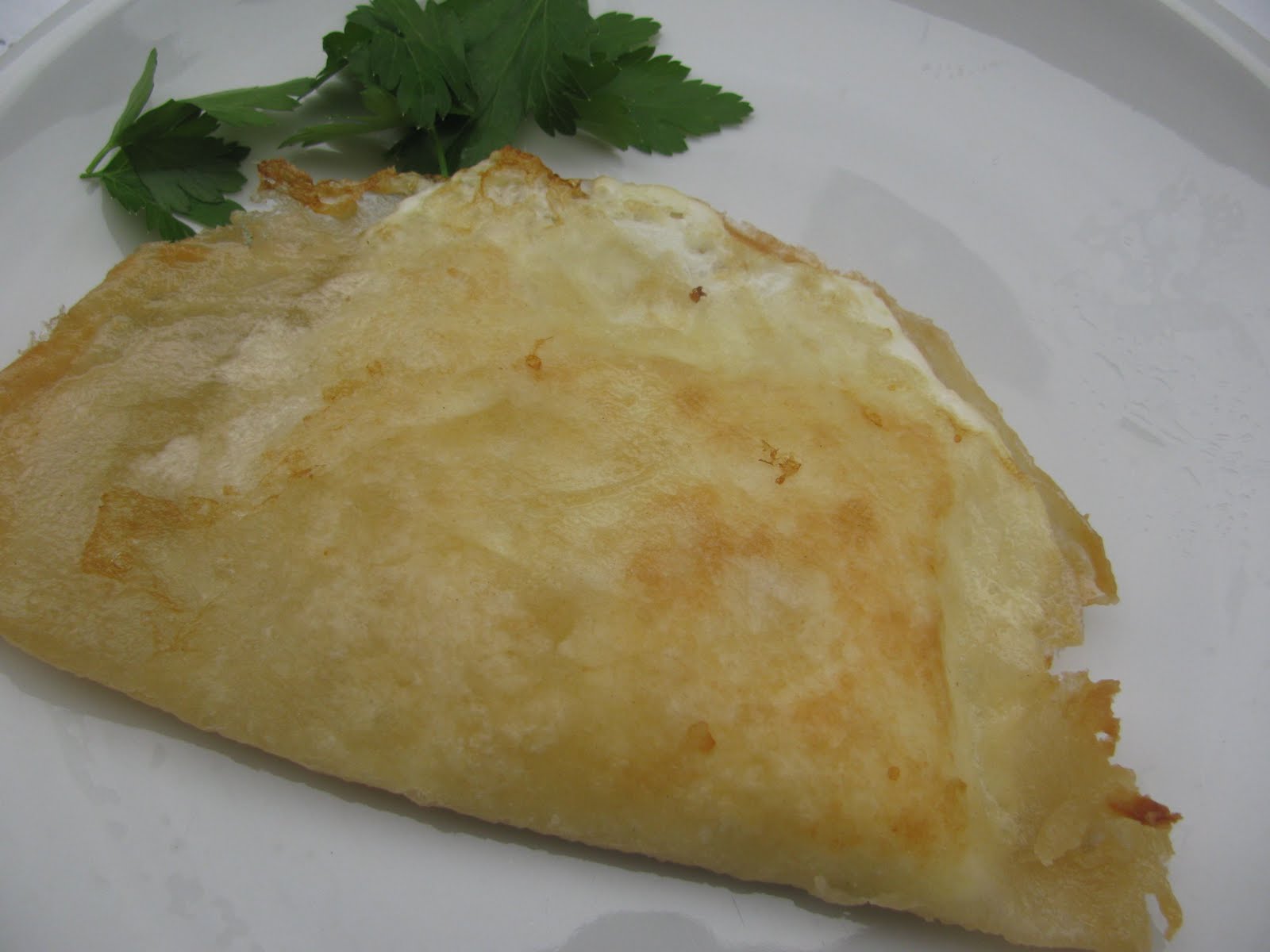 Cous Cous: Brik all'uovo Cous Cous: Brik all'uovo