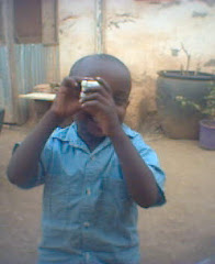 Ija'achi taking pictures with a lego set