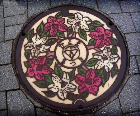 manhole cover art