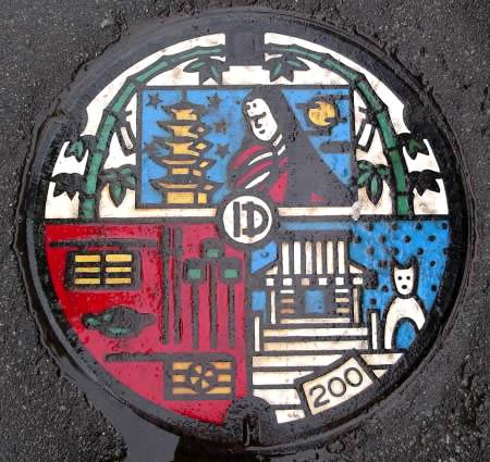 modern manhole cover art