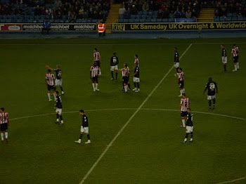 Millwall FC in the Championship 2010-2011  There is a link to this page above